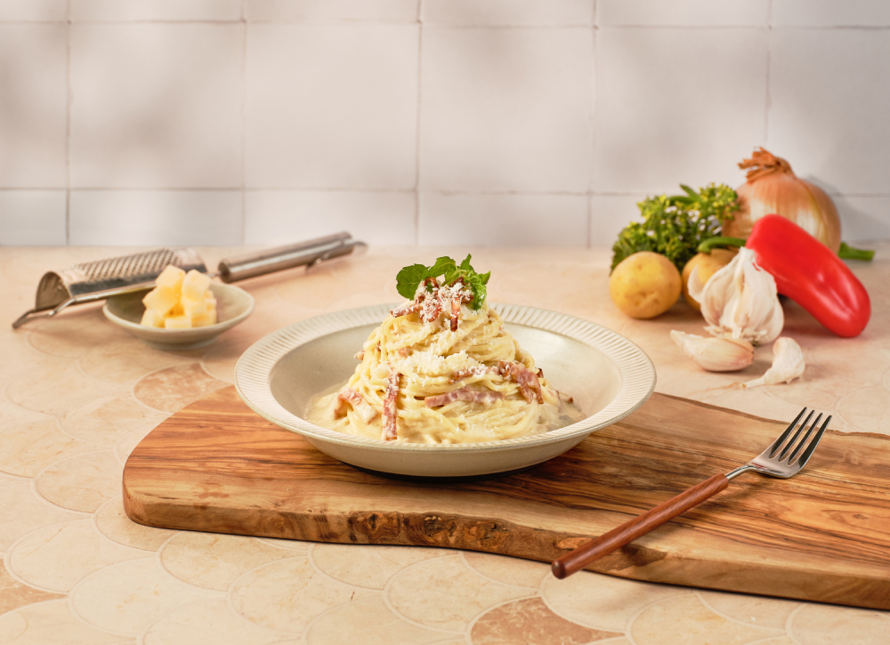 ▲奶香乳酪培根義大利麵。（圖/喜憨兒庇護工場提供）